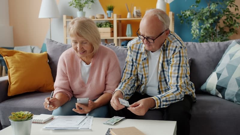 Senior couple reviewing their Medicare options at home